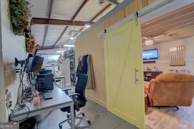 a view of a room with gym equipment