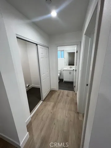 a view of a hallway view with staircase