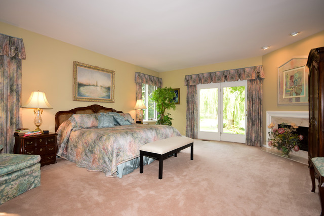 316 Trinity Lane Oak Brook, IL 60523 - Photo 13 of 25 a living room with furniture and a fireplace