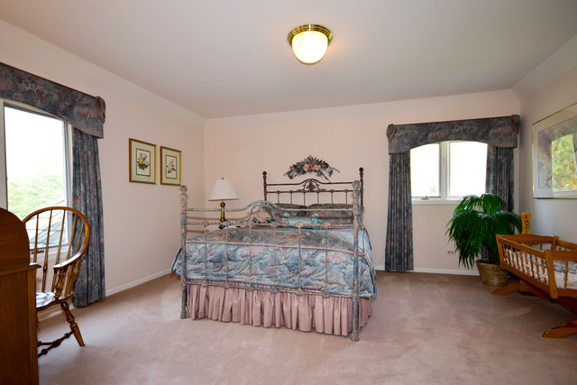 316 Trinity Lane Oak Brook, IL 60523 - Photo 16 of 25 a living room with furniture and a floor to ceiling window