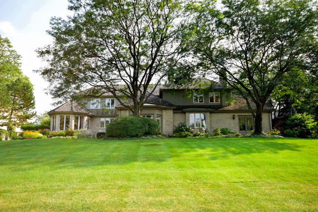 316 Trinity Lane Oak Brook, IL 60523 - Photo 24 of 25 a view of a house with a yard