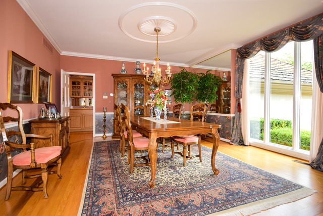 316 Trinity Lane Oak Brook, IL 60523 - Photo 5 of 25 a view of a dining room with furniture window and outside view