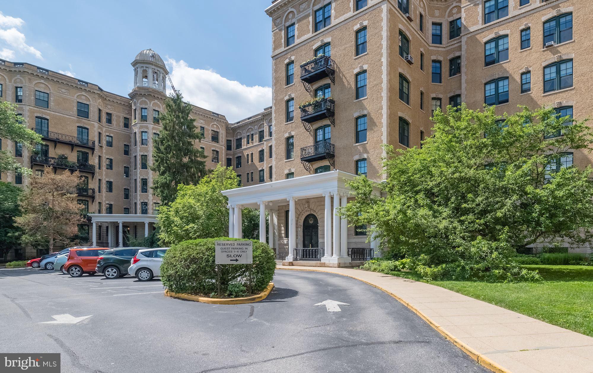a view of a building and yard