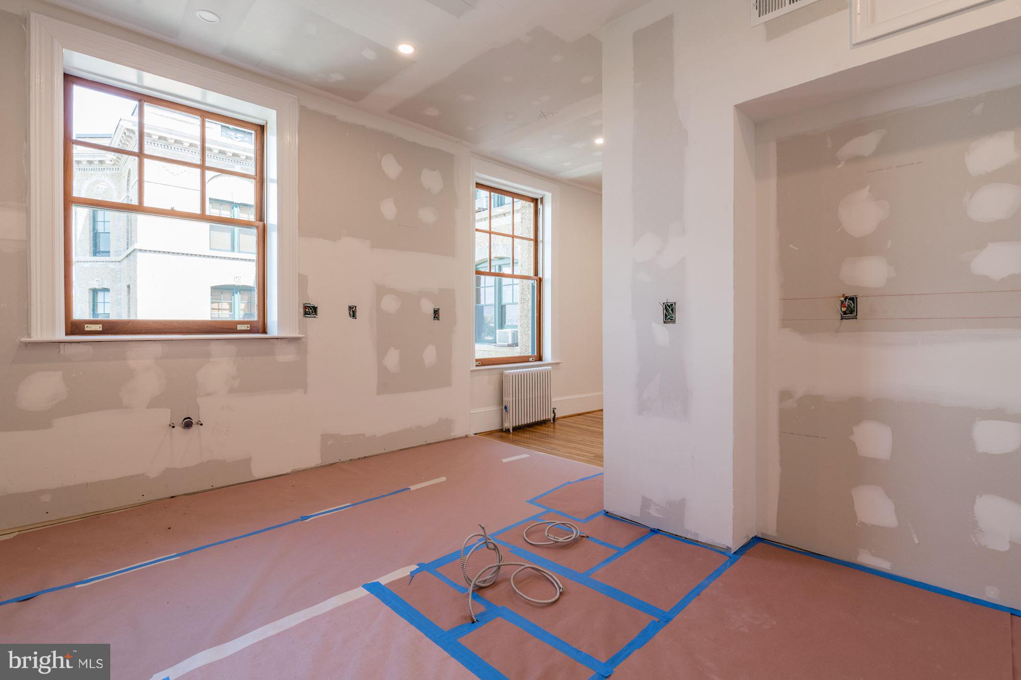 2853 Ontario Road Northwest, Unit 505 Washington, DC 20009 - Photo 17 of 29 an empty room with windows