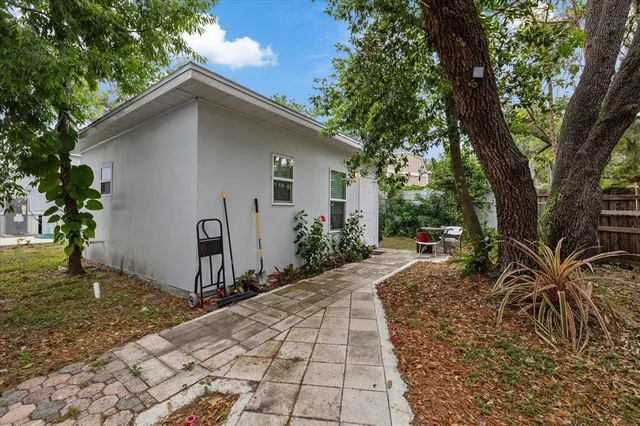 a backyard of a house with seating space