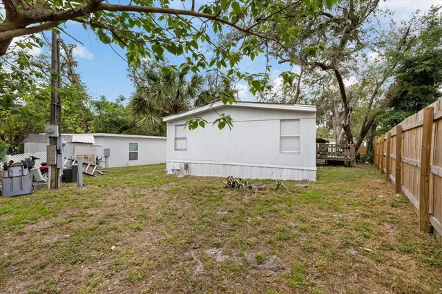 a house with trees in front of it