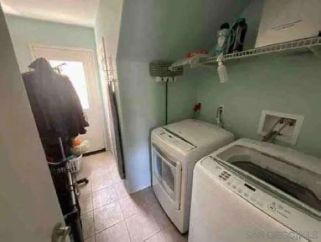 2552 Valley Waters Court Spring Valley, CA 91978 - Photo 15 of 16 a utility room with dryer and washer