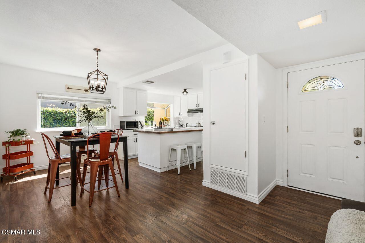 2142 Atwater Avenue Simi Valley, CA 93063 - Photo 11 of 36 a view of a dining room with furniture window and wooden floor