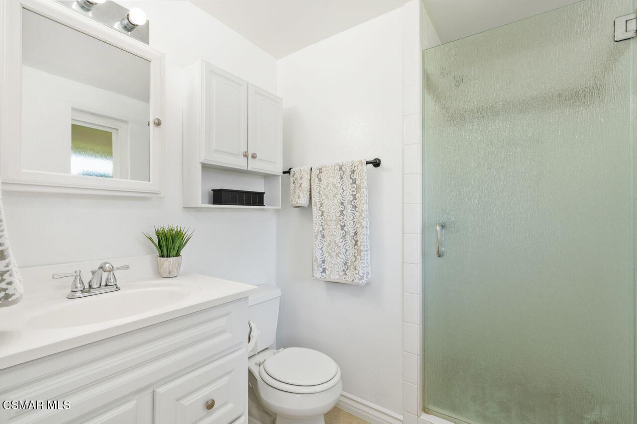 2142 Atwater Avenue Simi Valley, CA 93063 - Photo 28 of 36 a bathroom with a sink a toilet and shower