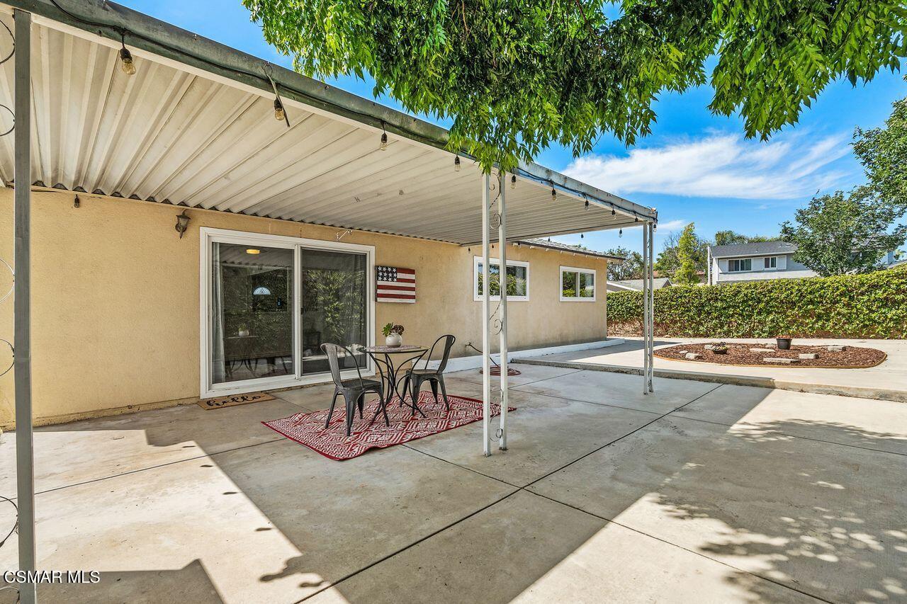 2142 Atwater Avenue Simi Valley, CA 93063 - Photo 32 of 36 a view of a patio with table and chairs and potted plants
