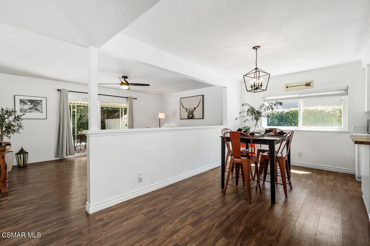 2142 Atwater Avenue Simi Valley, CA 93063 - Photo 9 of 36 a dining room with furniture and wooden floor
