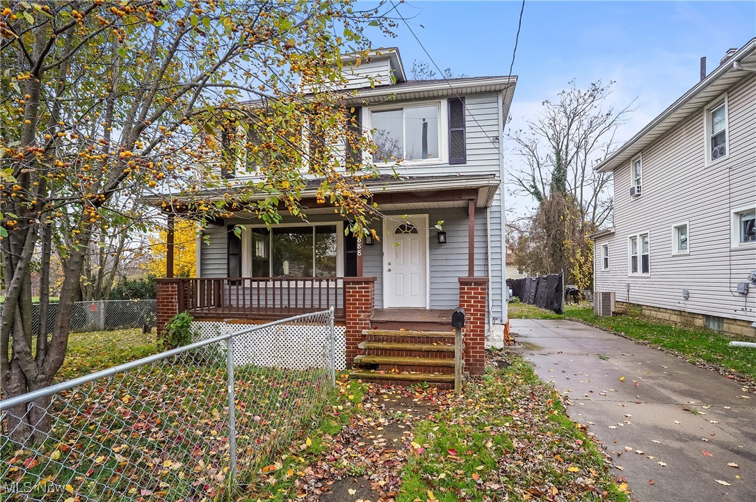 888 Dan Street Akron, OH 44310 - Photo 1 of 36 View of front of home featuring a porch and cooling unit