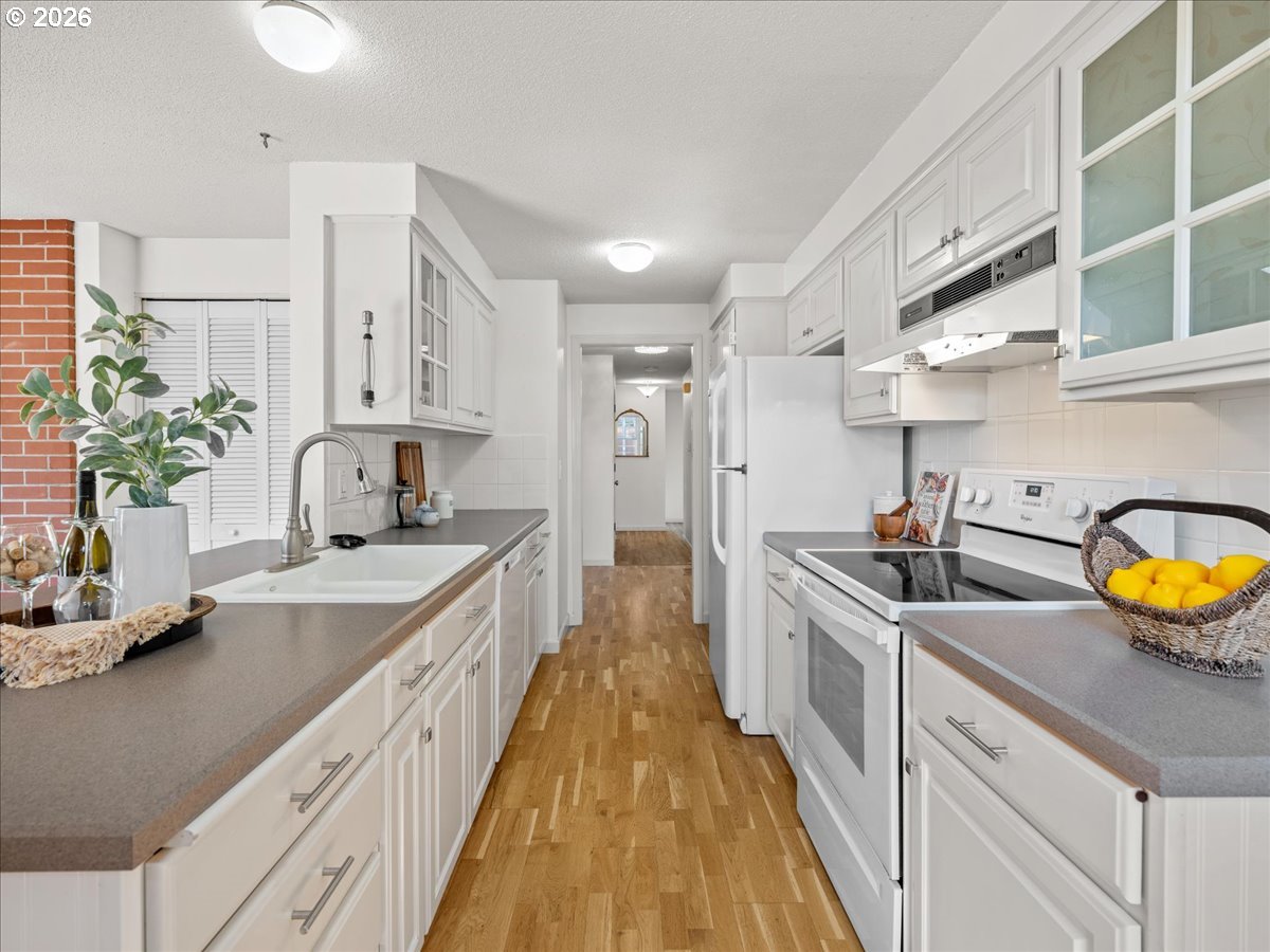 3775 3rd Avenue North Keizer, OR 97303 - Photo 15 of 32 a view of a kitchen with a sink and cabinets