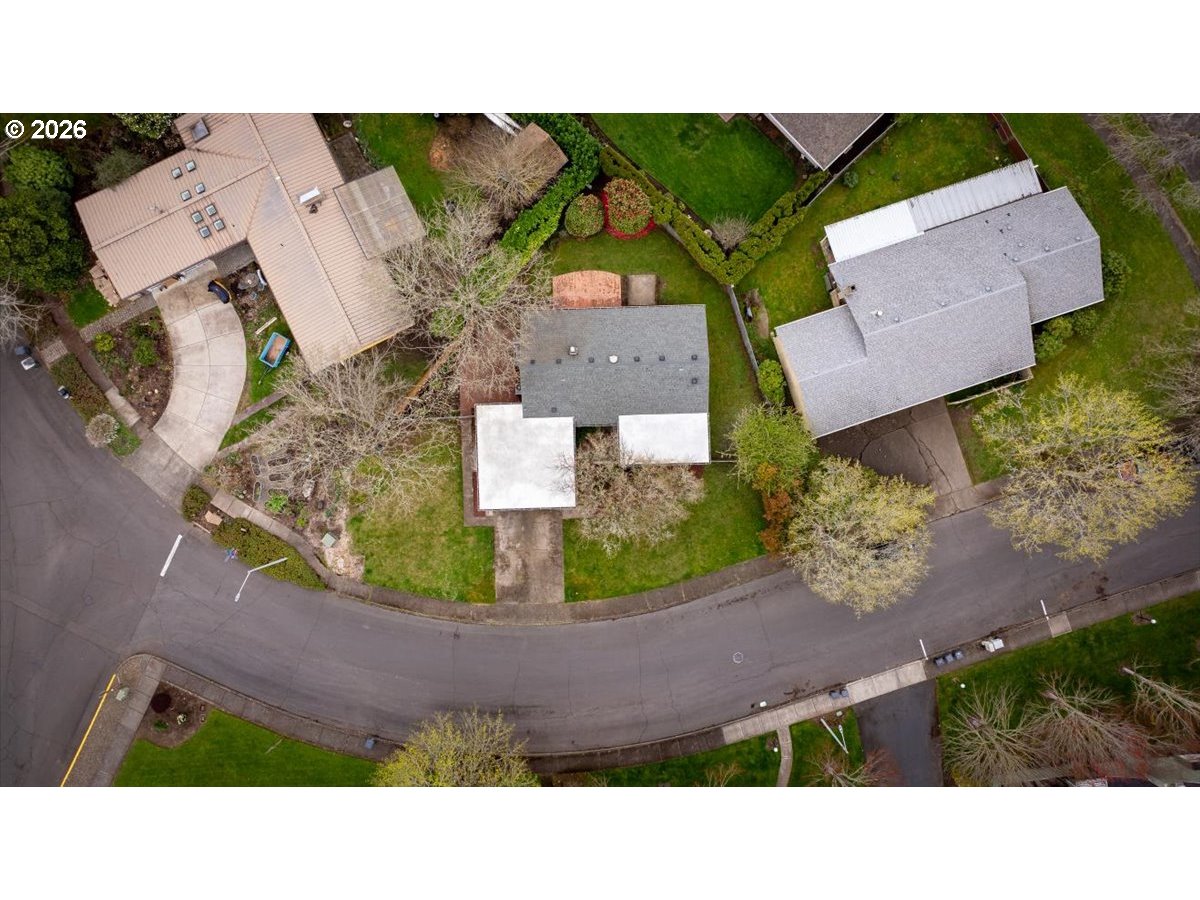 3775 3rd Avenue North Keizer, OR 97303 - Photo 29 of 32 an aerial view of a house with a yard and lake view