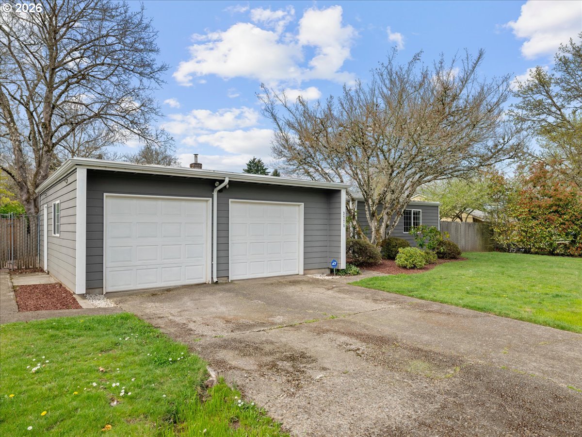 3775 3rd Avenue North Keizer, OR 97303 - Photo 3 of 32 a backyard of a house with garage and garage