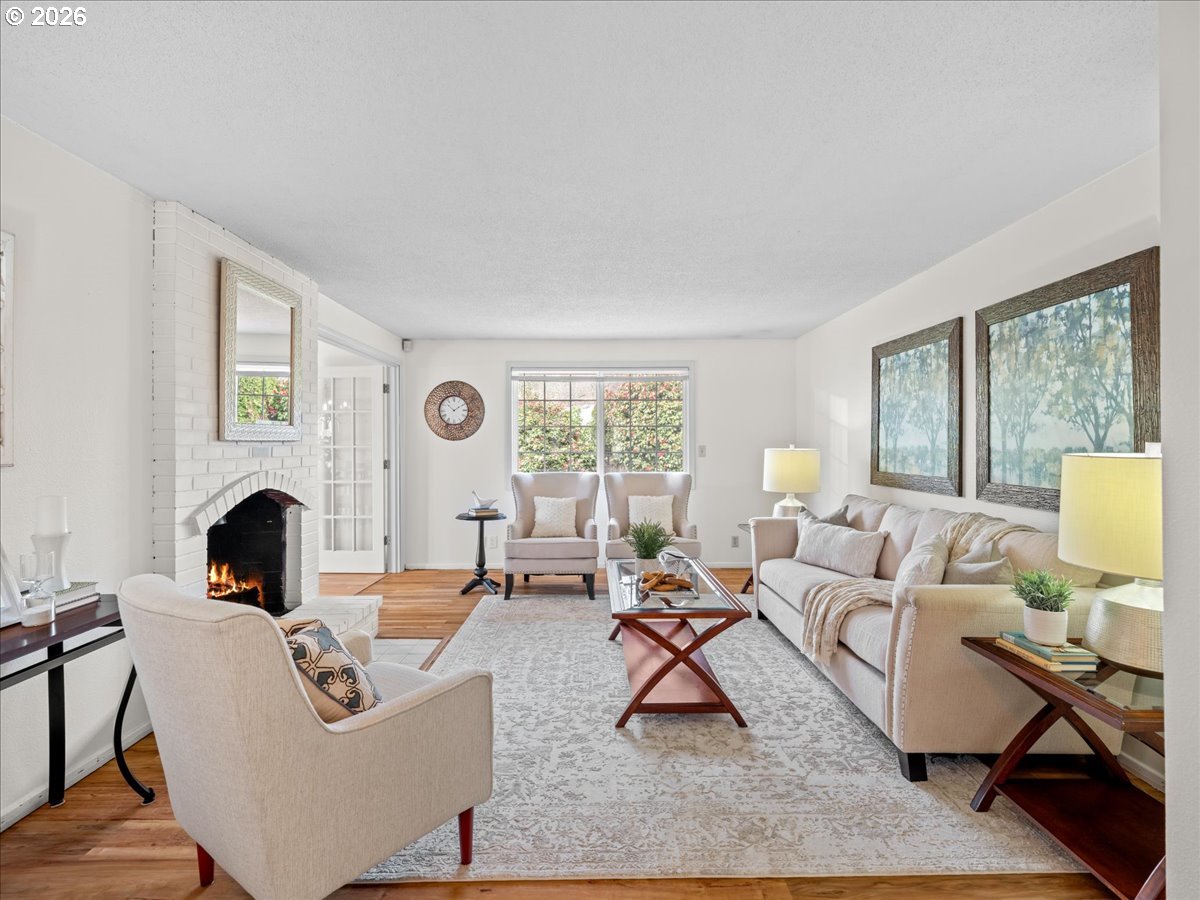 3775 3rd Avenue North Keizer, OR 97303 - Photo 6 of 32 a living room with fireplace furniture and a large window