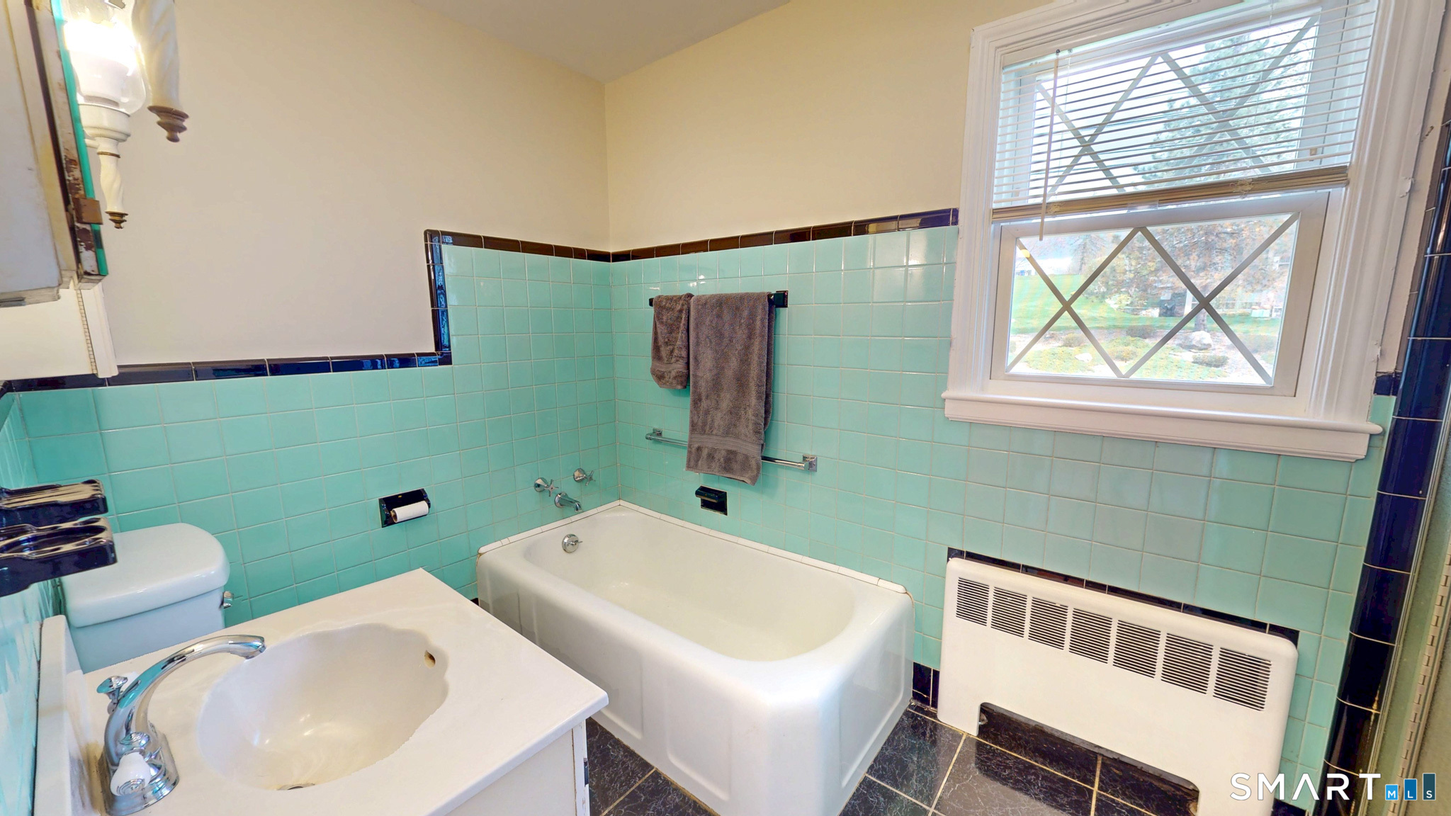 99 Sunset Ridge Drive East Hartford, CT 06118 - Photo 21 of 39 a bathroom with a sink and a toilet