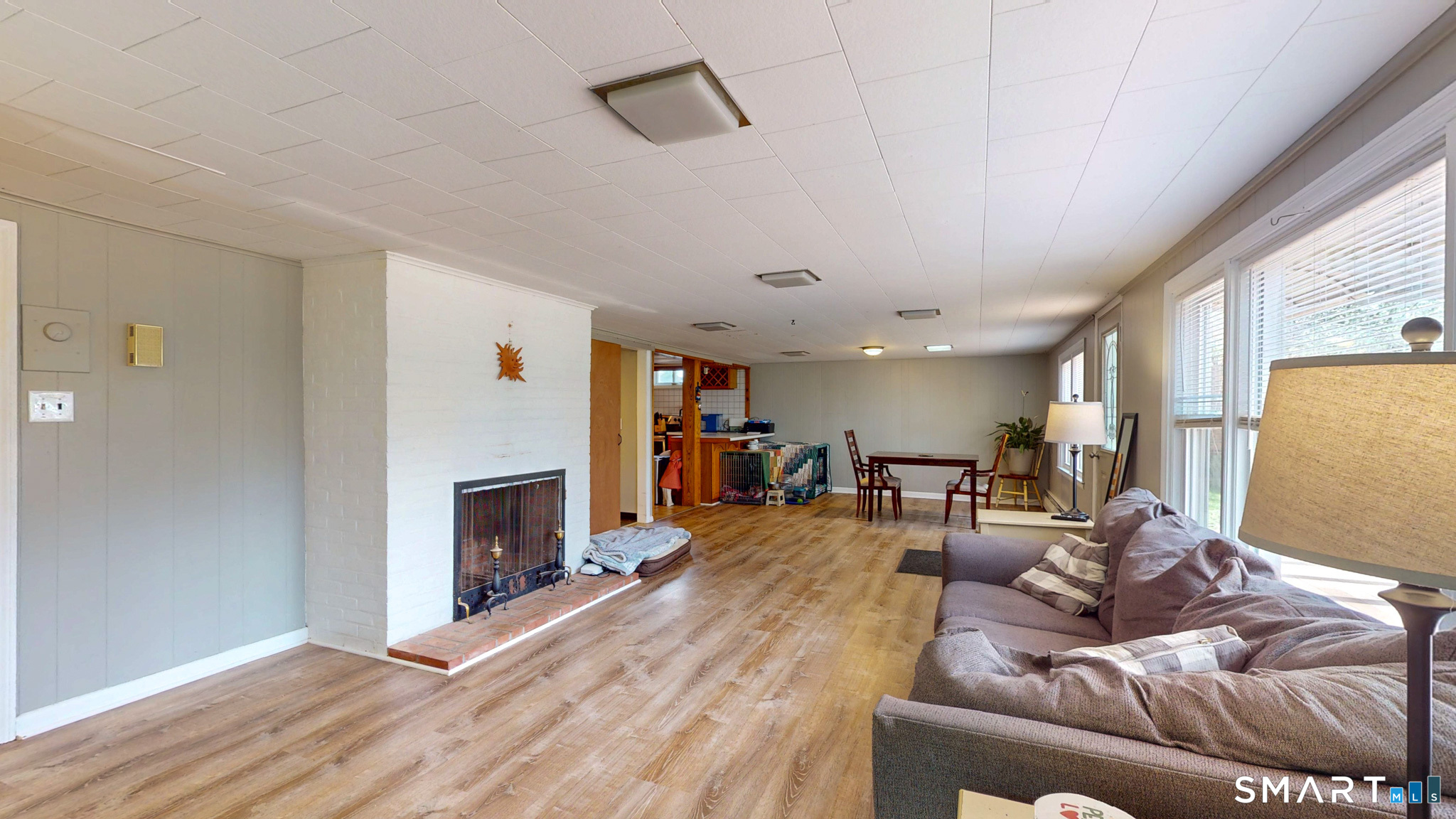 99 Sunset Ridge Drive East Hartford, CT 06118 - Photo 24 of 39 a living room with furniture and a fireplace