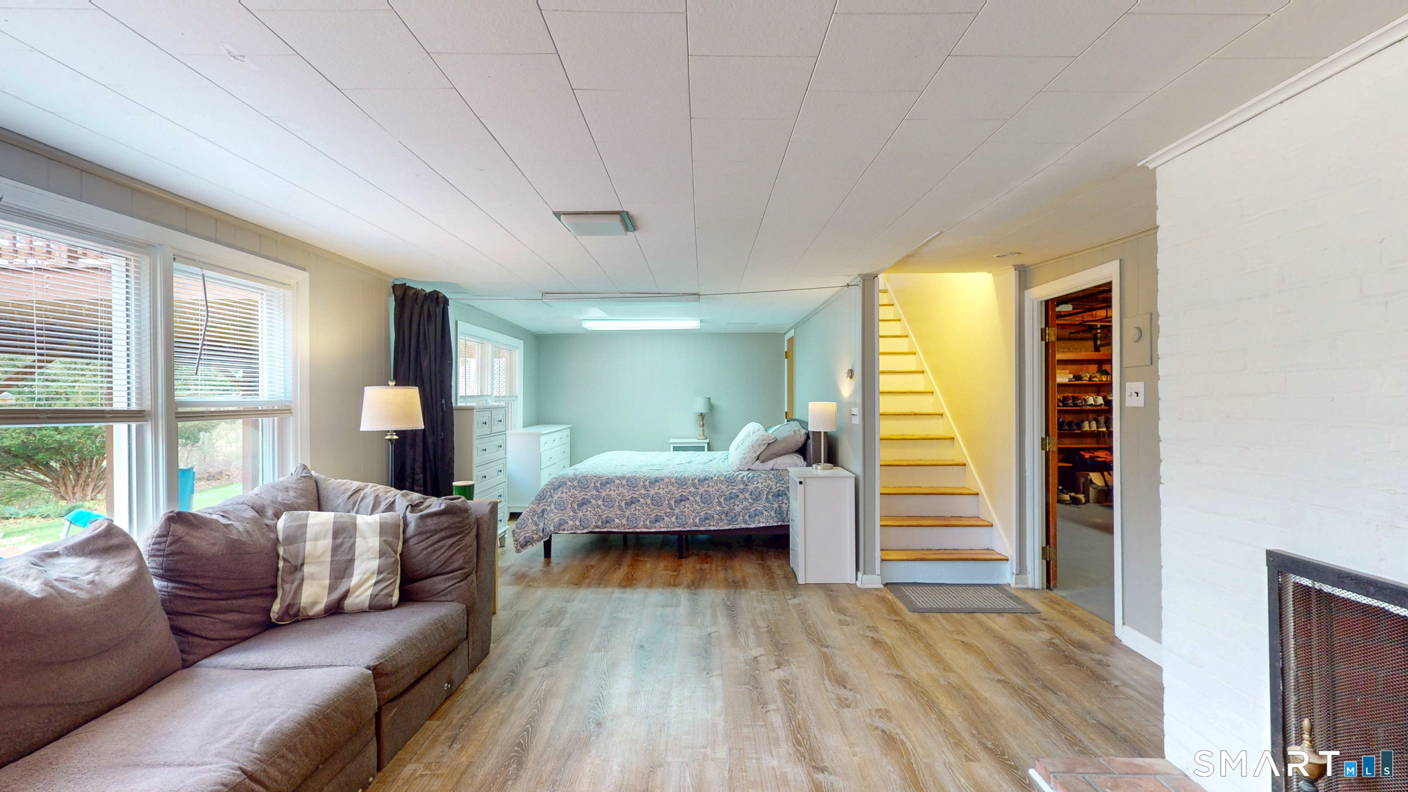 99 Sunset Ridge Drive East Hartford, CT 06118 - Photo 25 of 39 a living room with furniture and a wooden floor