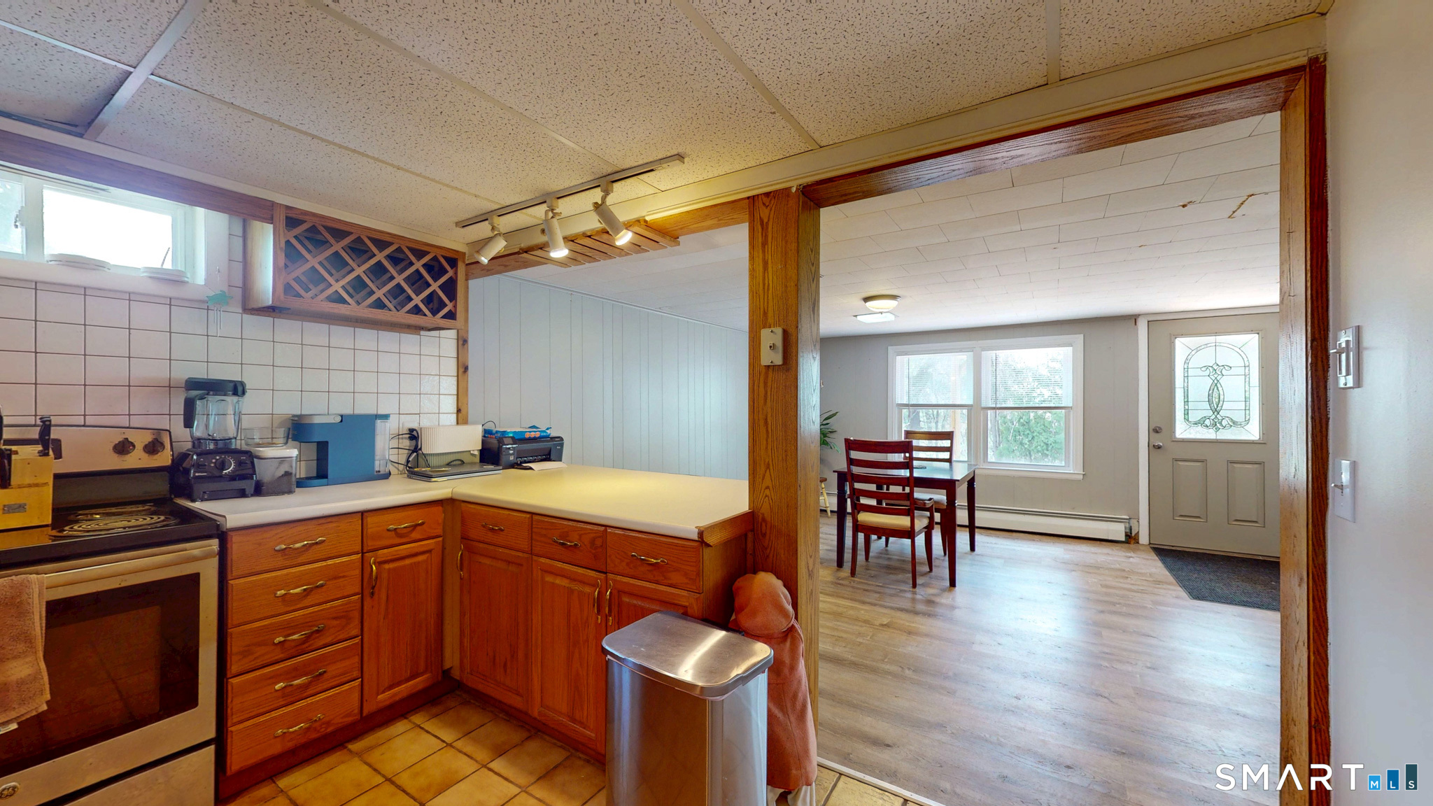 99 Sunset Ridge Drive East Hartford, CT 06118 - Photo 28 of 39 a kitchen with a sink a counter space appliances and cabinets
