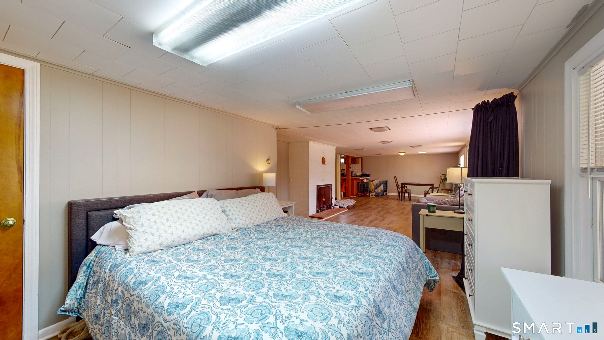 99 Sunset Ridge Drive East Hartford, CT 06118 - Photo 30 of 39 a bedroom with a bed and a flat tv screen on the dresser