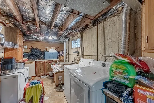 a utility room with a washer and dryer