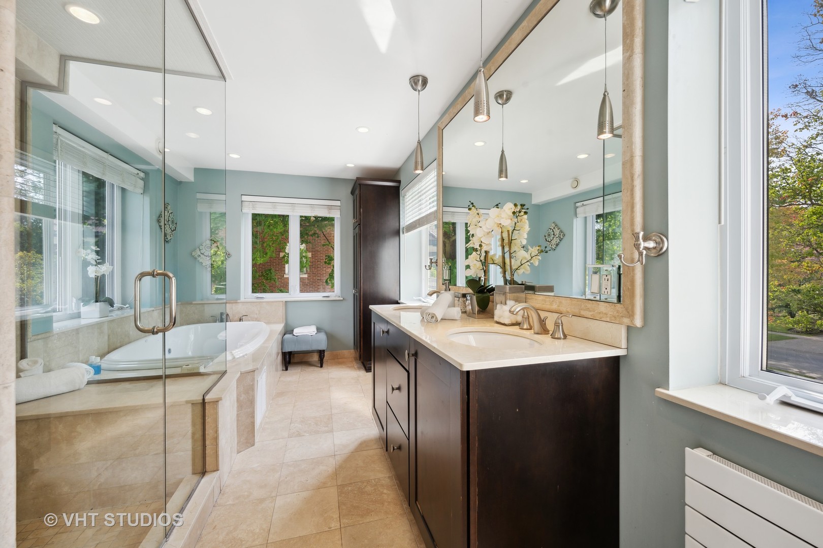 823 Jackson Avenue River Forest, IL 60305 - Photo 16 of 44 a spacious bathroom with a granite countertop sink and a large mirror