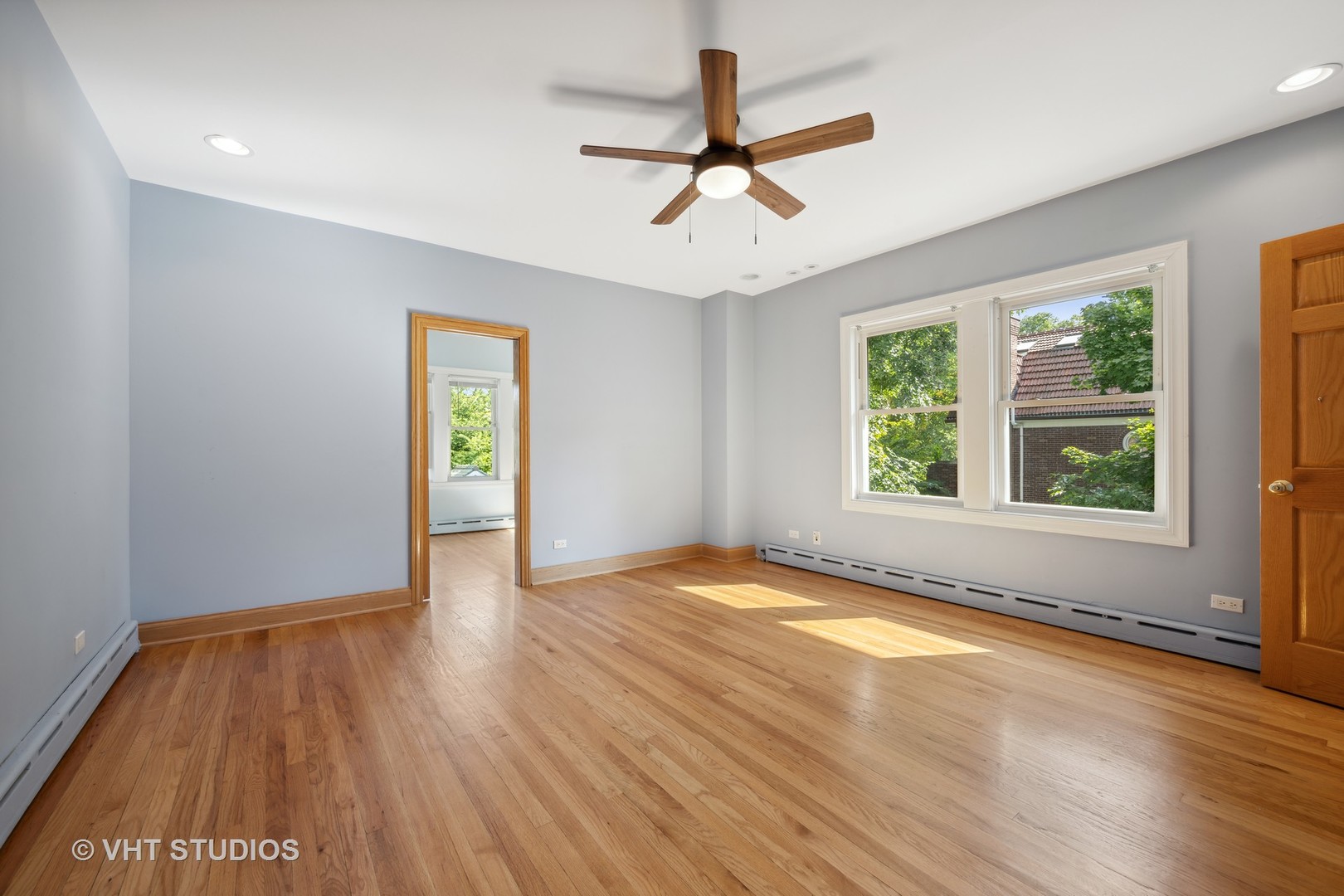 823 Jackson Avenue River Forest, IL 60305 - Photo 17 of 44 a view of an empty room with wooden floor and a window