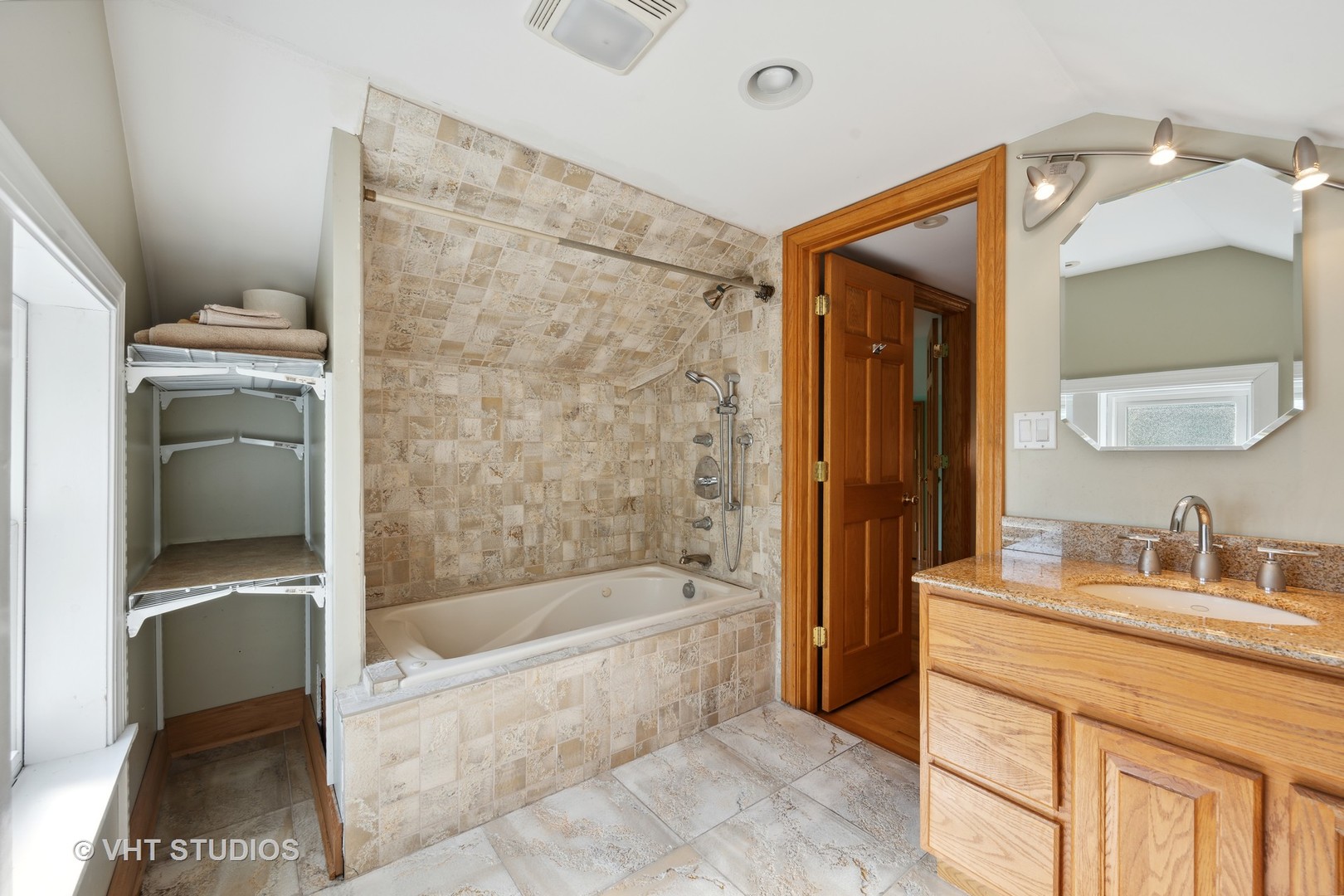 823 Jackson Avenue River Forest, IL 60305 - Photo 24 of 44 a bathroom with a tub sink and mirror