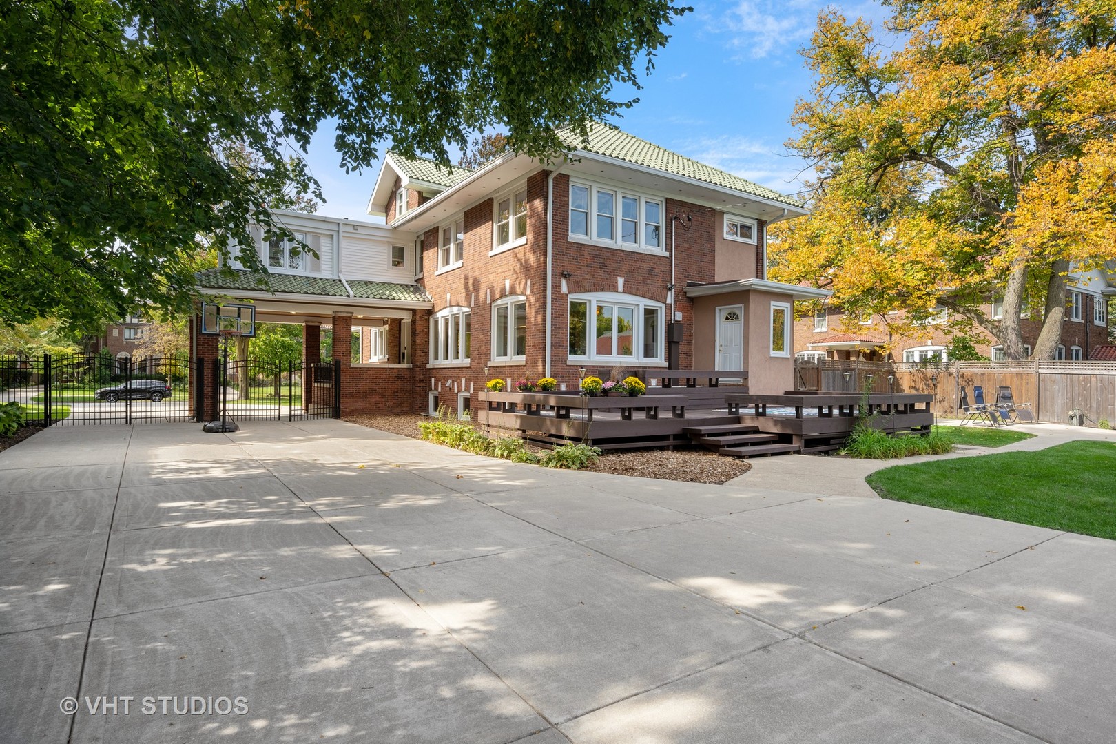823 Jackson Avenue River Forest, IL 60305 - Photo 29 of 44 a view of a white house with a yard covered with tall trees