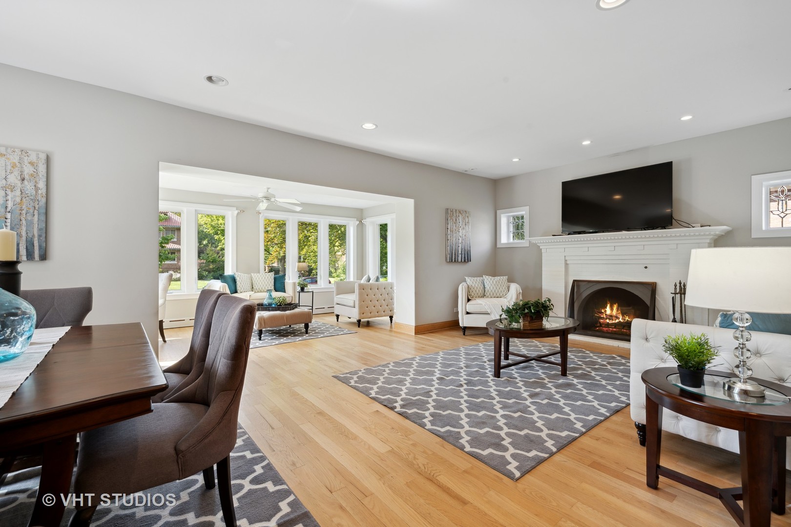 823 Jackson Avenue River Forest, IL 60305 - Photo 5 of 44 a living room with furniture a flat screen tv and a fireplace