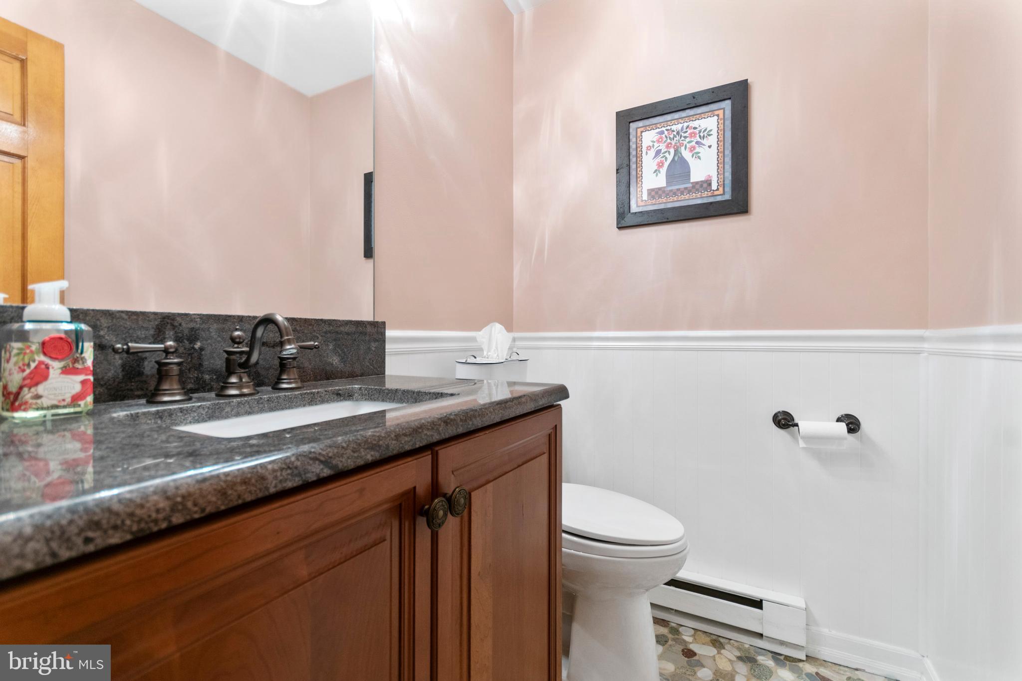 557 Linfield Road Royersford, PA 19468 - Photo 13 of 63 Powder Room w/granite vanity & pebble stone floor