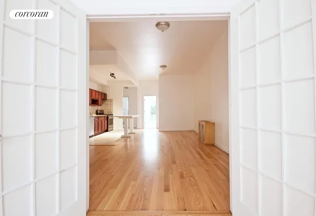 a hallway with wooden floor