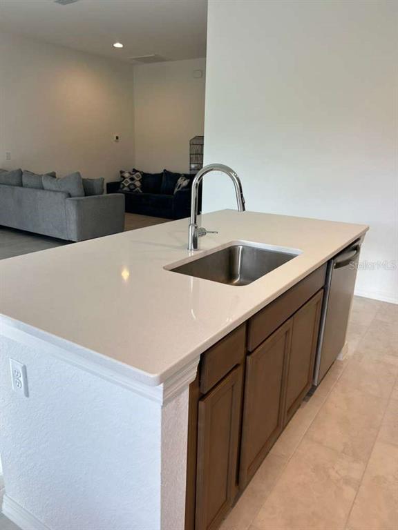 2203 Carson Loop Lake Lake Wales, FL 33859 - Photo 8 of 14 a close view of sink and tap