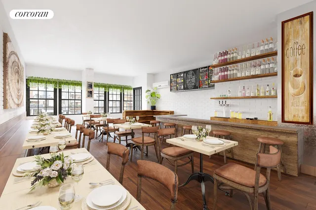 a kitchen with stainless steel appliances white cabinets and wooden floor