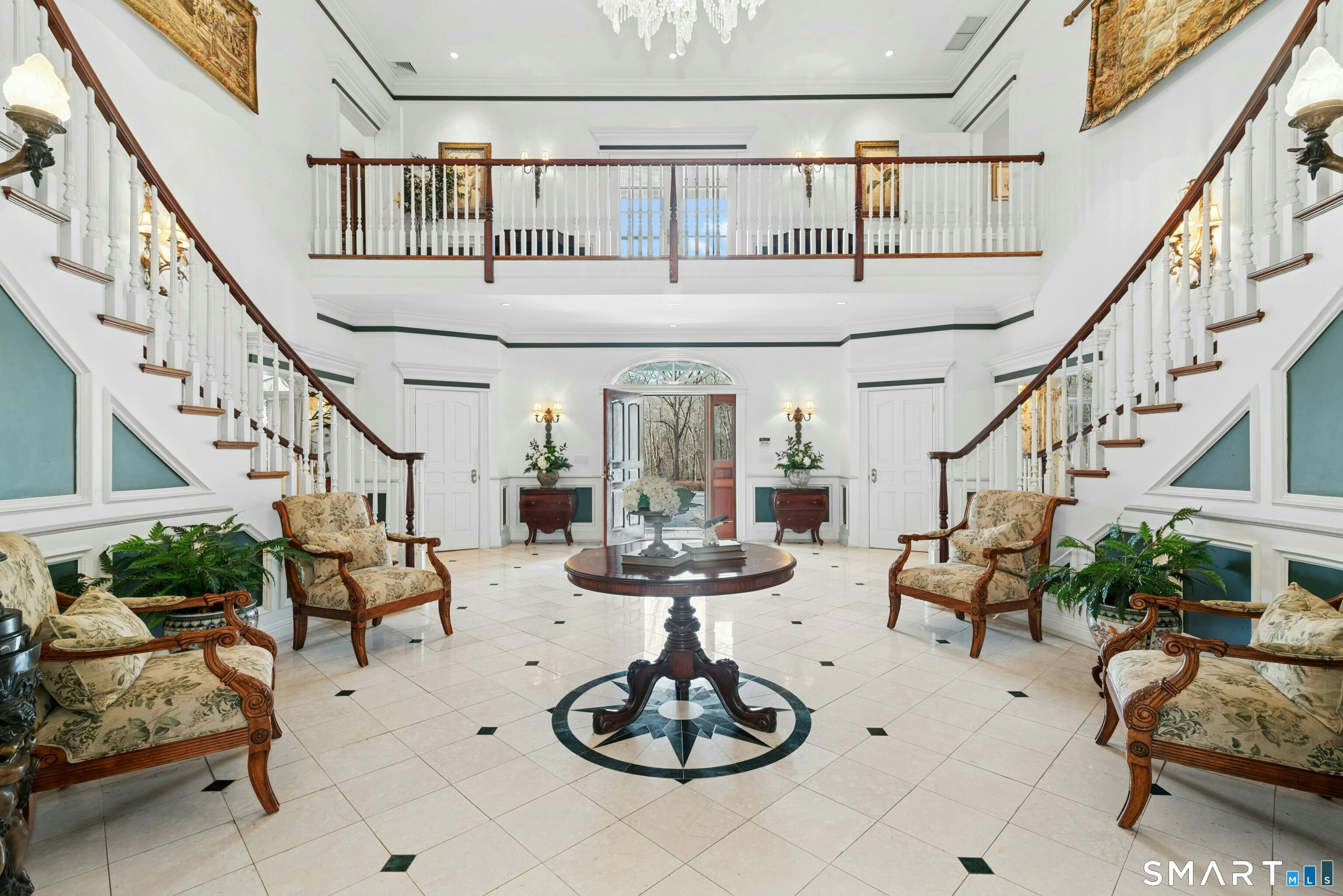 63 Turney Road Redding, CT 06896 - Photo 2 of 40 Dual staircase, interior balcony