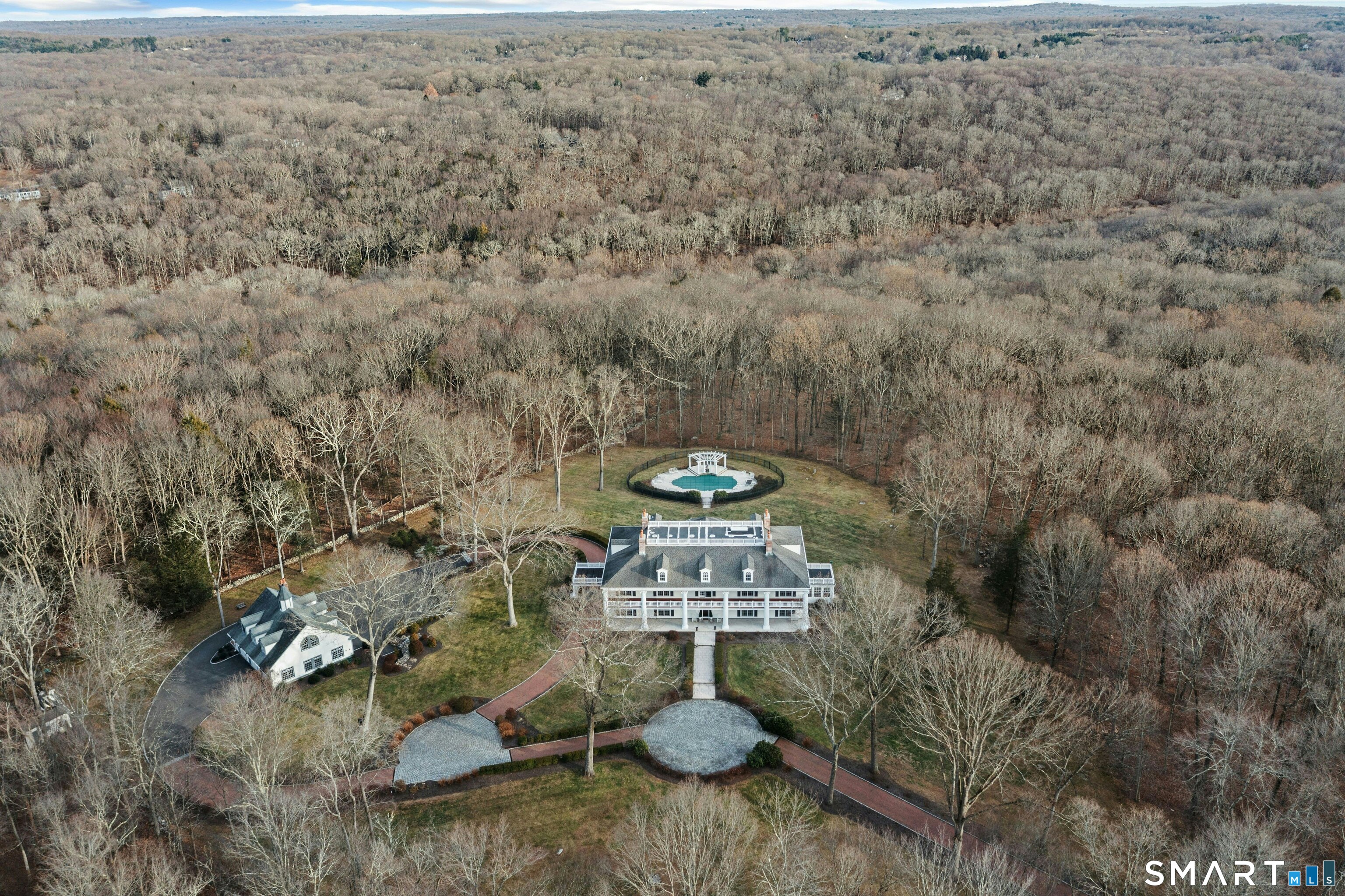 63 Turney Road Redding, CT 06896 - Photo 40 of 40 Aerial view. To the rear, this property abuts 100+ acres of Redding Land Trust and Acquarion woodlands.