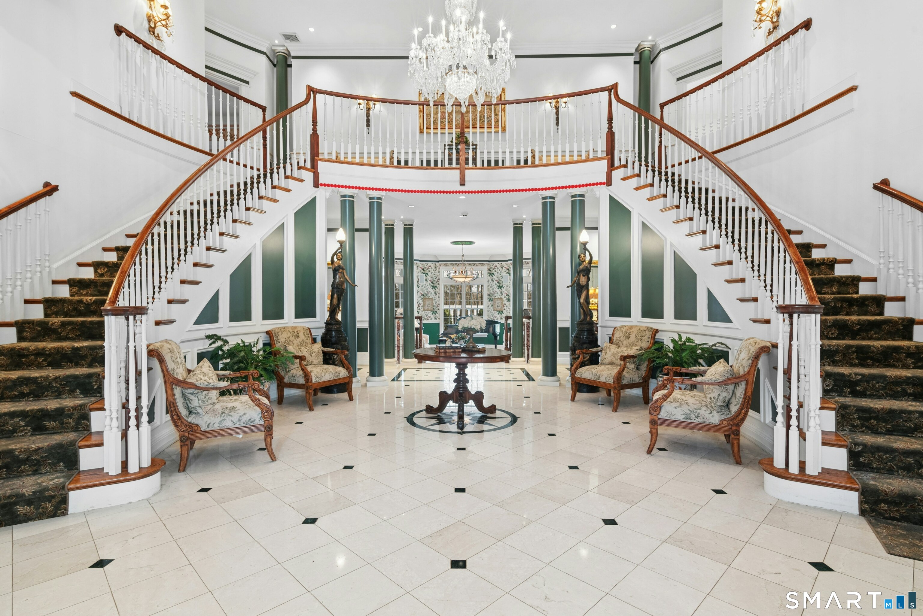 63 Turney Road Redding, CT 06896 - Photo 7 of 40 Entrance Foyer. Classic dome ceiling, cove lighting, crystal chandelier and vibrant fresco detail