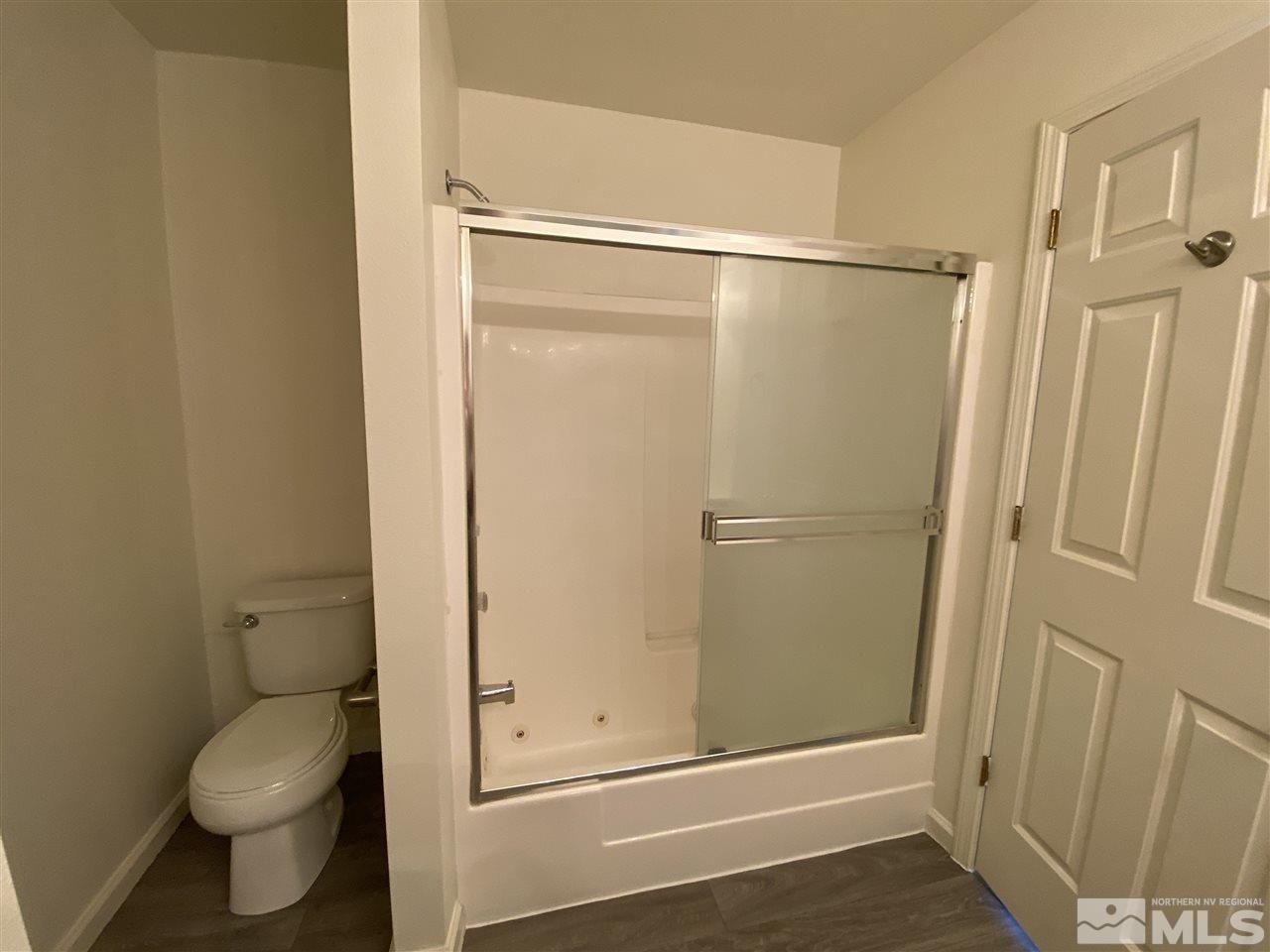 1200 Lattin Road Fallon, NV 89406 - Photo 14 of 19 a bathroom that has a glass shower door