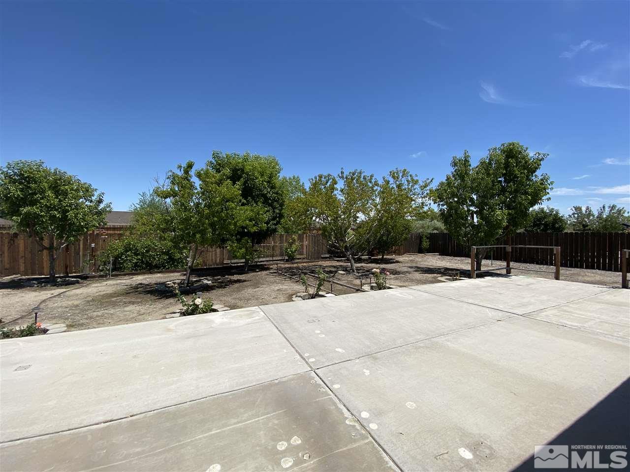 1200 Lattin Road Fallon, NV 89406 - Photo 17 of 19 a view of a backyard of a house