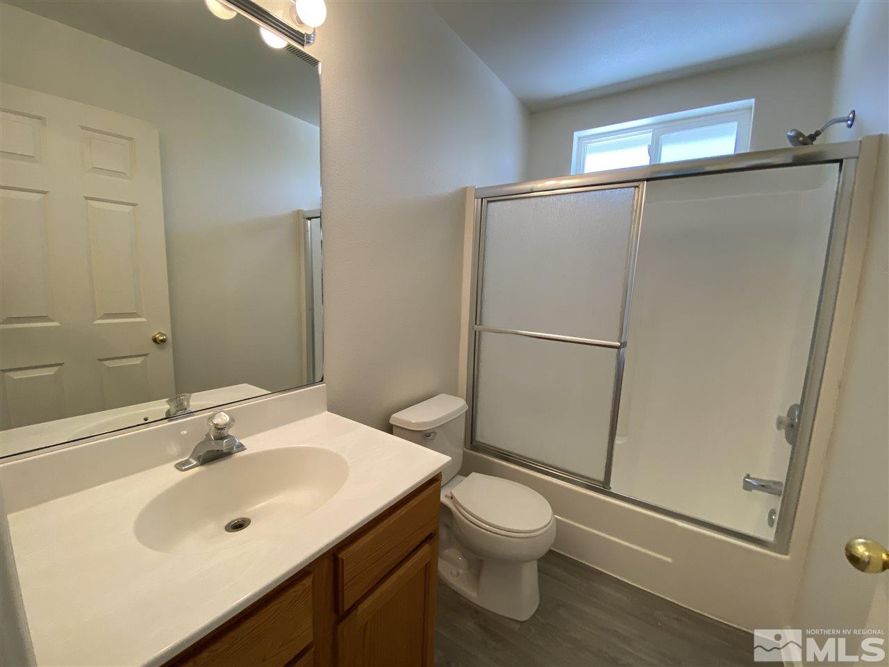 1200 Lattin Road Fallon, NV 89406 - Photo 10 of 19 a bathroom with a sink toilet and shower
