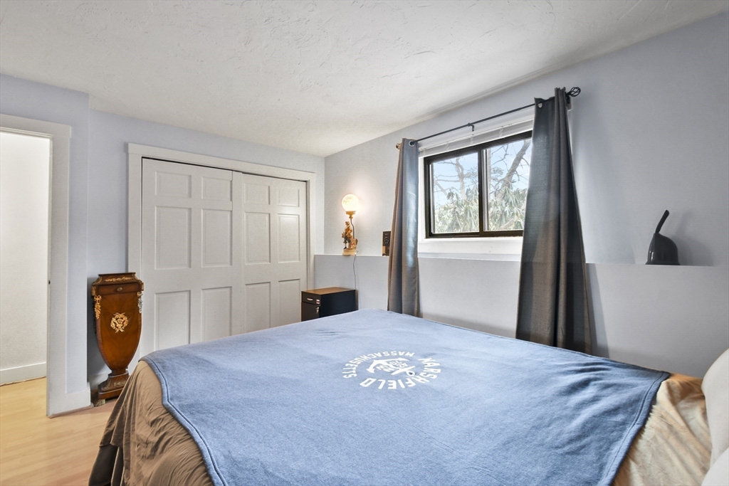 976 Plain Street, Unit 48 Marshfield, MA 02050 - Photo 19 of 20 a view of a livingroom with furniture and window