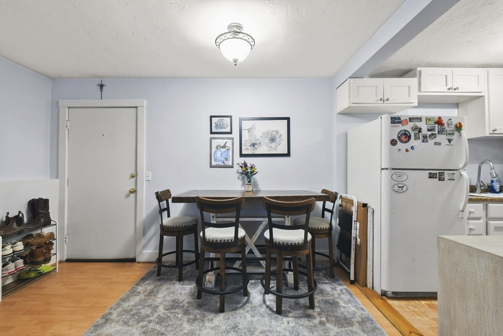 976 Plain Street, Unit 48 Marshfield, MA 02050 - Photo 4 of 20 a view of a dining room with furniture