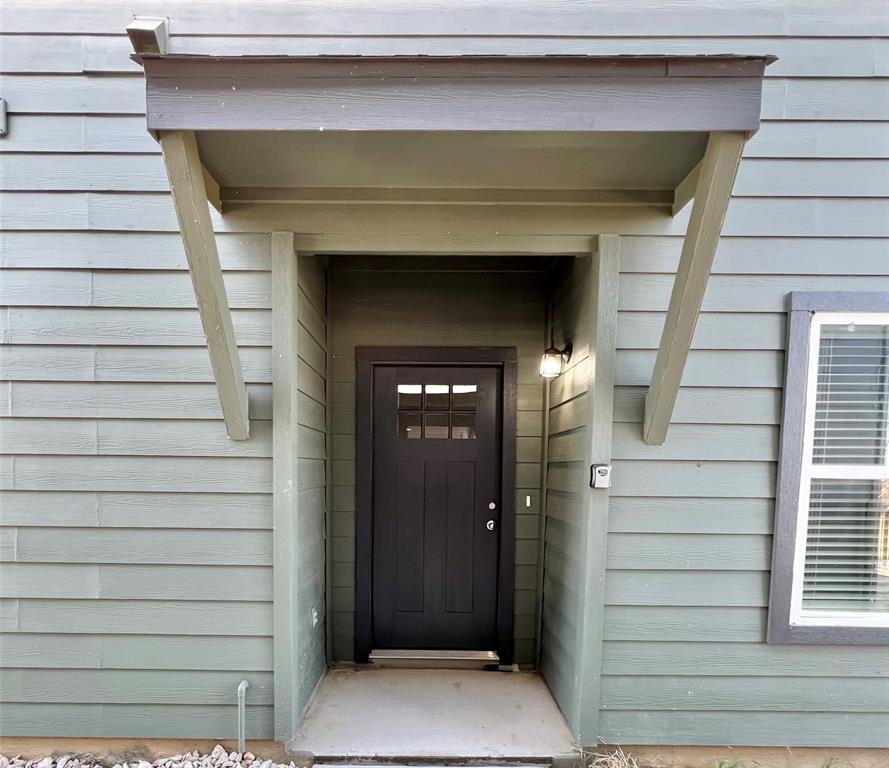 3501 East Renfro Street, Unit 614 Burleson, TX 76028 - Photo 3 of 35 a view of entryway door of the house