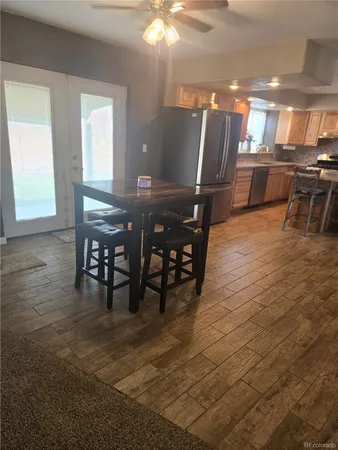 a view of a dining room with furniture