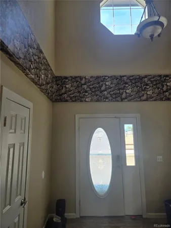 a view of a kitchen with a sink