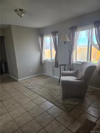 a car parked in front of a house