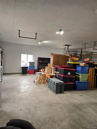 a view of gym equipment and children play room