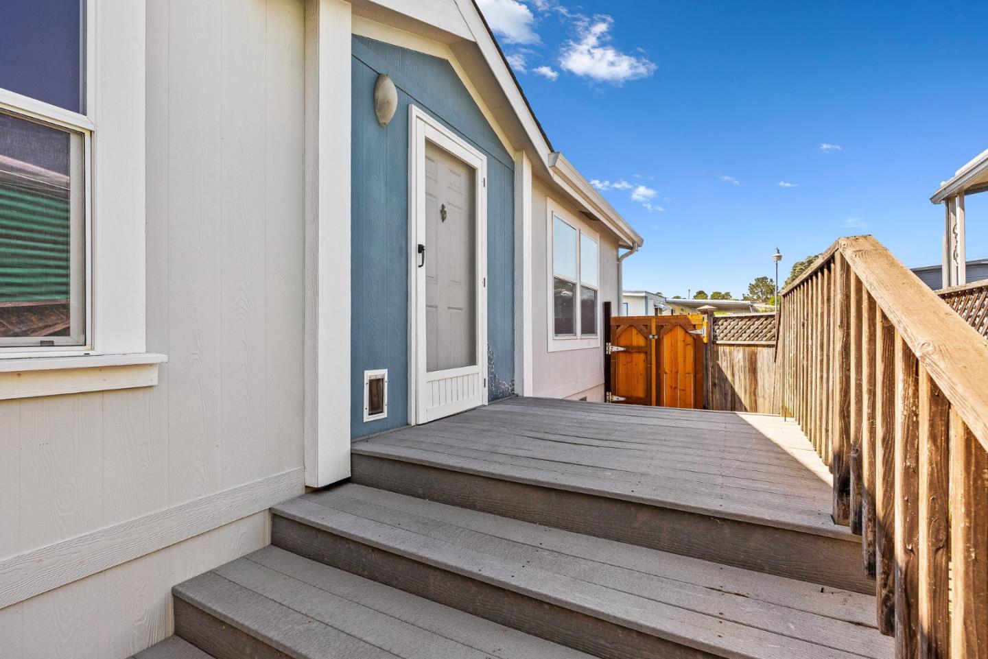 2155 Wharf Road, Unit 9 Capitola, CA 95010 - Photo 2 of 27 a view of balcony and wooden floor