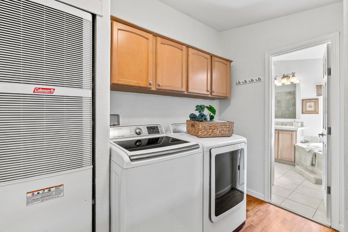 2155 Wharf Road, Unit 9 Capitola, CA 95010 - Photo 24 of 27 a kitchen with stainless steel appliances granite countertop a stove a sink and a refrigerator